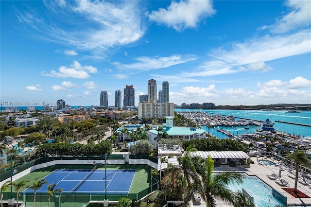 birds eye view of property with a water view