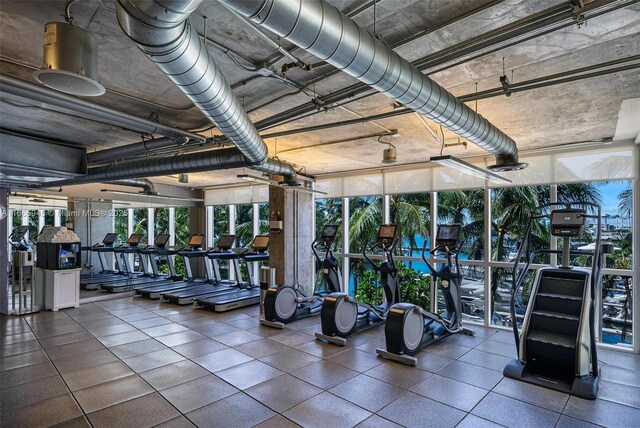 gym featuring floor to ceiling windows