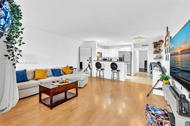 living room featuring light wood-type flooring