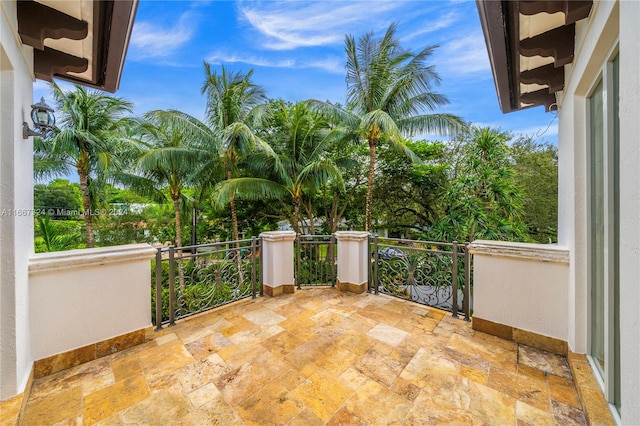 view of patio with a balcony