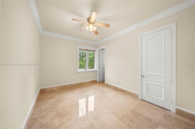 unfurnished room with crown molding and ceiling fan