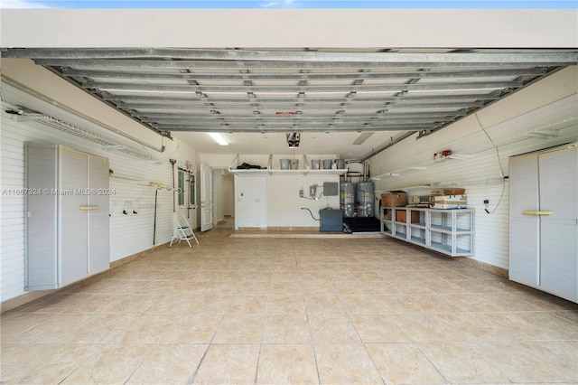 garage featuring gas water heater