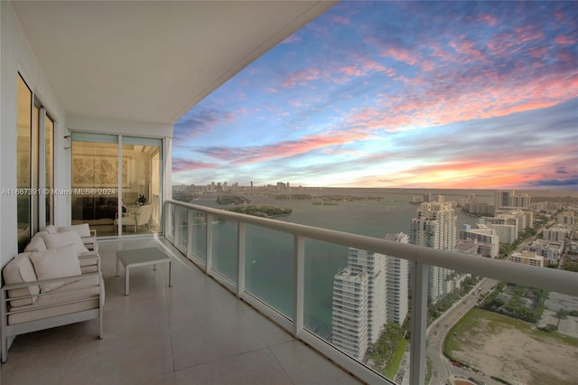 view of balcony at dusk