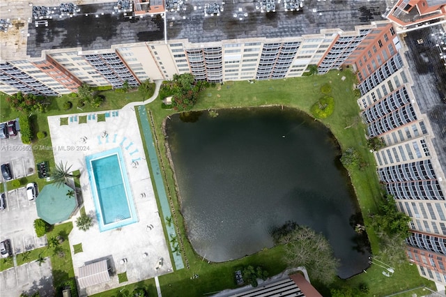 drone / aerial view with a water view