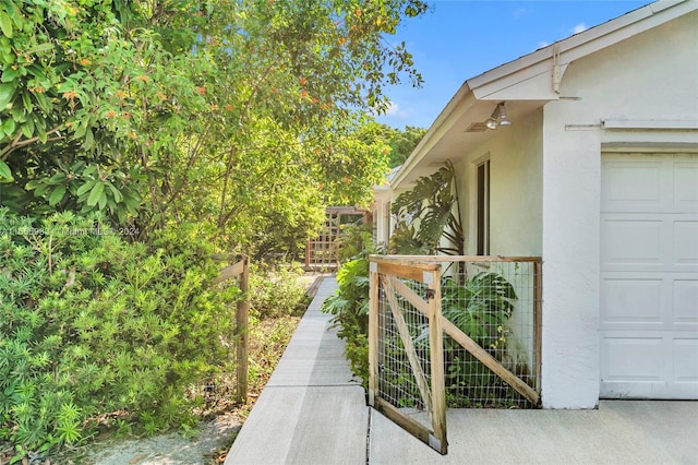 view of home's exterior with a wooden deck