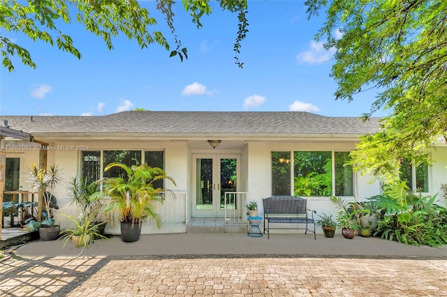 back of house featuring french doors and a patio area