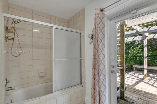 bathroom featuring shower / bath combo with shower curtain