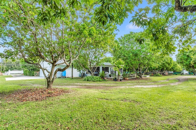 view of yard featuring a garage