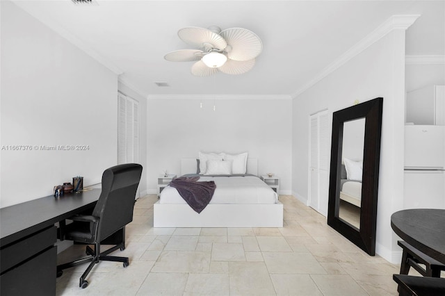 bedroom with ceiling fan, crown molding, and white fridge