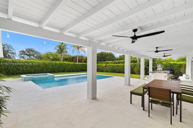 view of swimming pool featuring an in ground hot tub, a patio, and ceiling fan