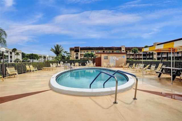 view of swimming pool featuring a patio