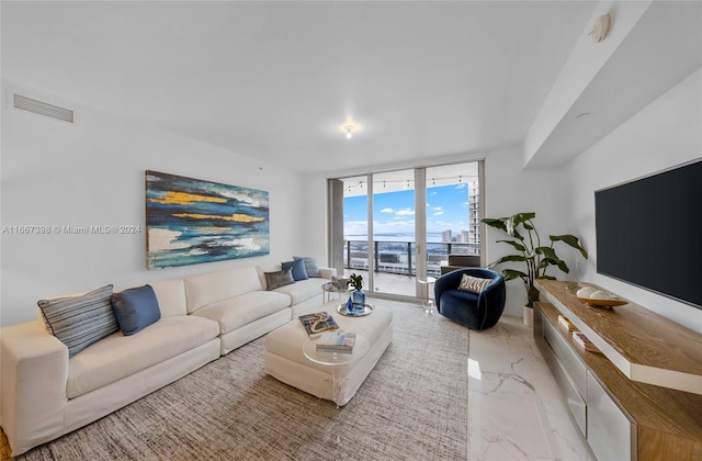 living room featuring expansive windows