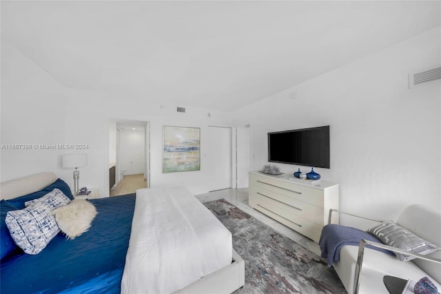 bedroom with vaulted ceiling