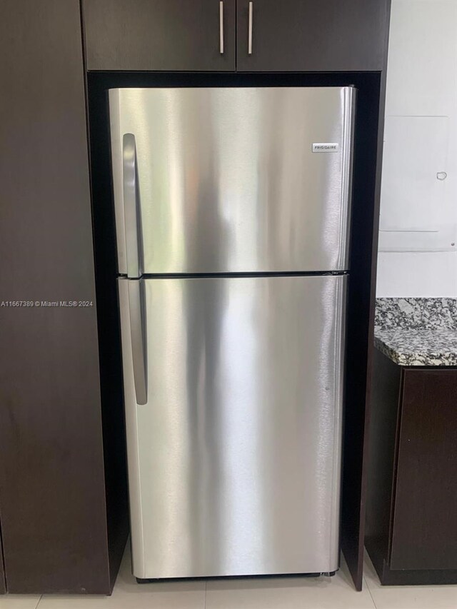 room details with stainless steel refrigerator