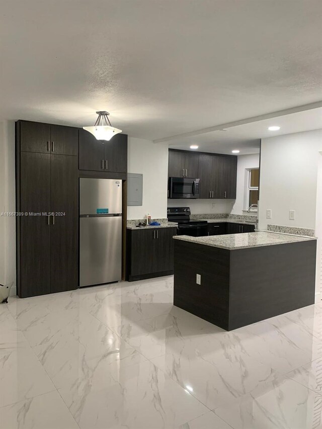 kitchen with kitchen peninsula and stainless steel appliances