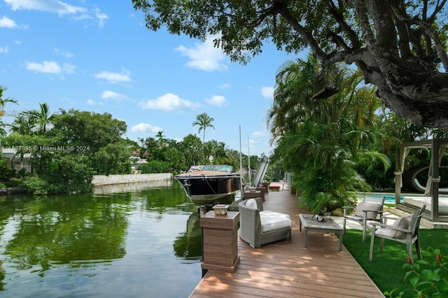 view of dock with a water view