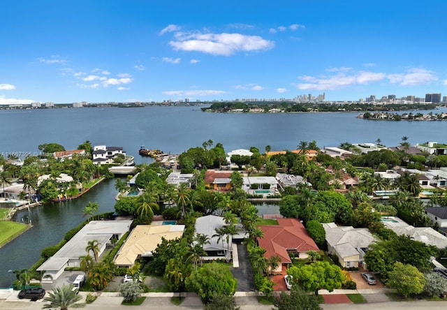 birds eye view of property featuring a water view