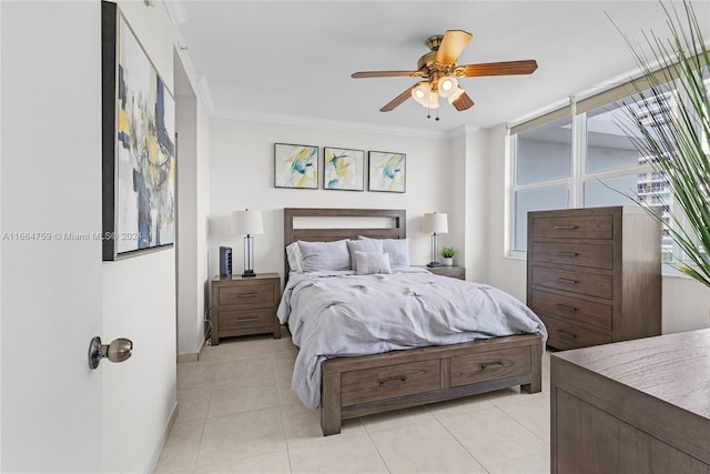 bedroom featuring light tile patterned floors, ornamental molding, and ceiling fan