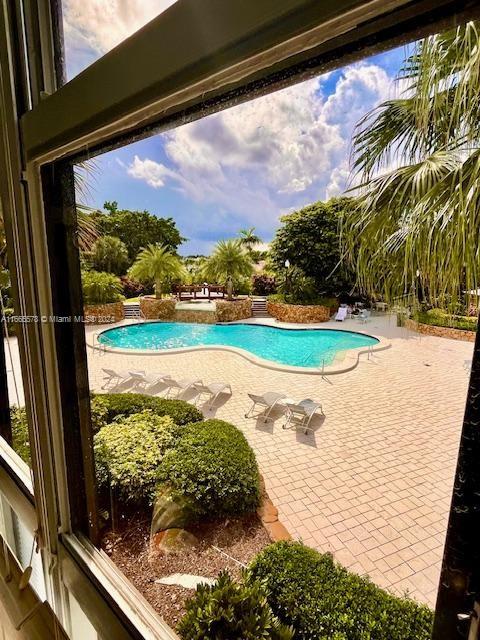 view of pool featuring a patio area