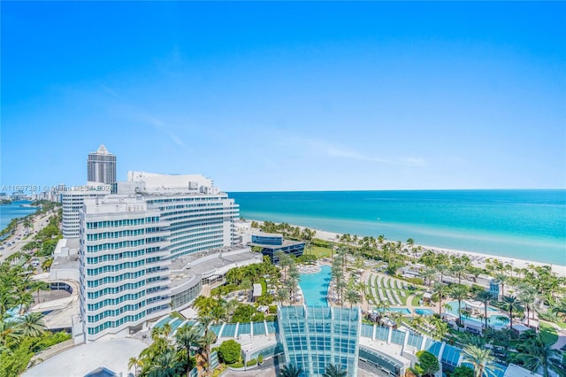 drone / aerial view with a view of the beach and a water view