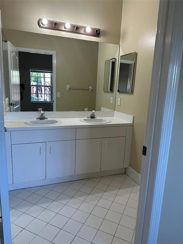 bathroom featuring vanity and tile patterned flooring