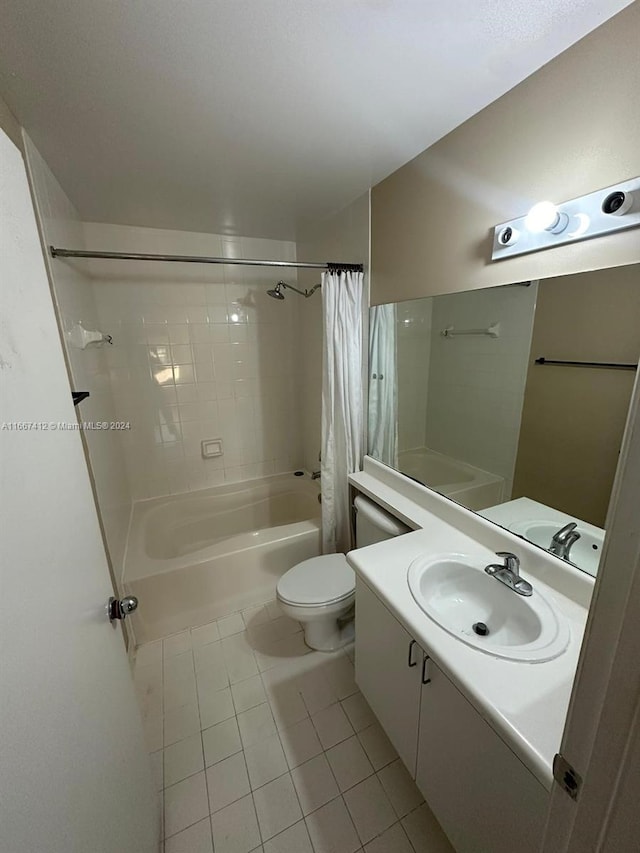 full bathroom featuring vanity, toilet, shower / bathtub combination with curtain, and tile patterned floors