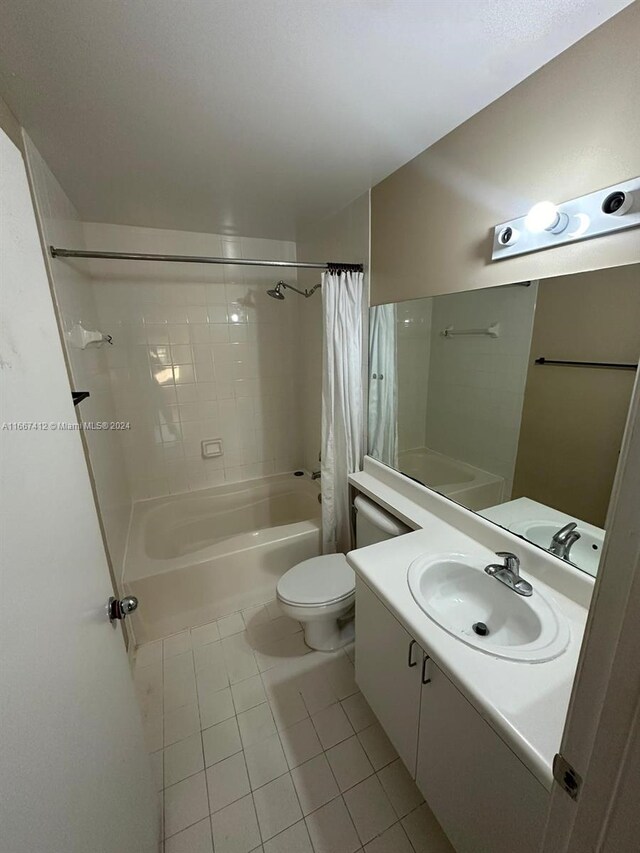 4848 N State Road 7 Unit 4305, Coconut Creek, FL 33073 - bathroom with tile patterned floors, shower / bathtub combination with curtain, and vanity