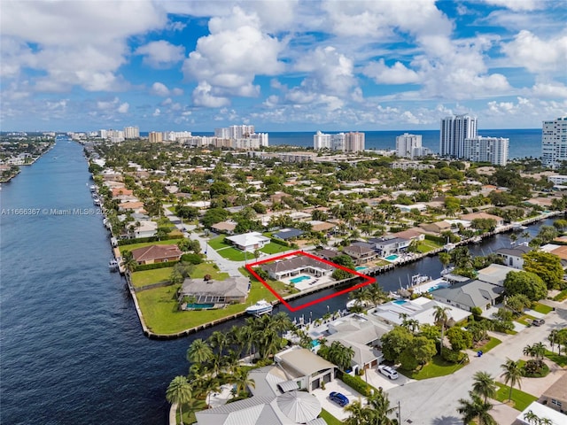 bird's eye view with a water view