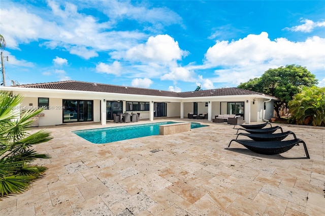 view of pool featuring a patio and an outdoor hangout area