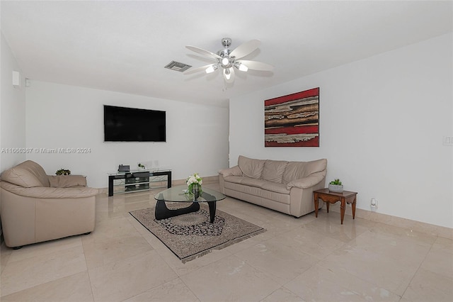 living room featuring ceiling fan