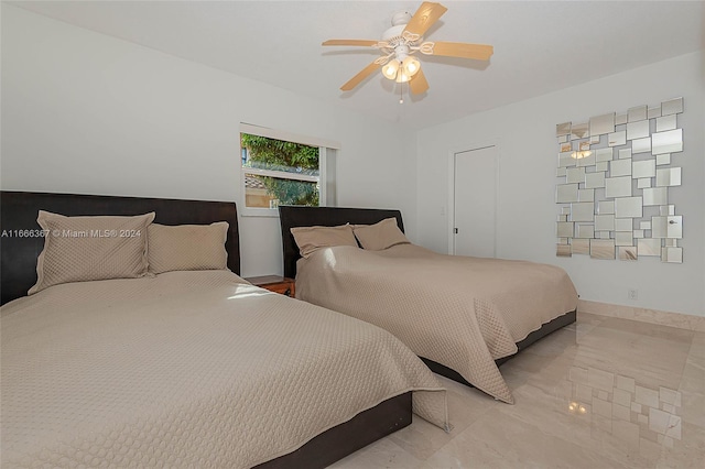 bedroom featuring ceiling fan