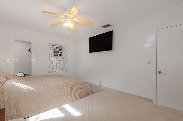 bedroom featuring ceiling fan