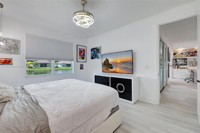 bedroom featuring light wood-type flooring