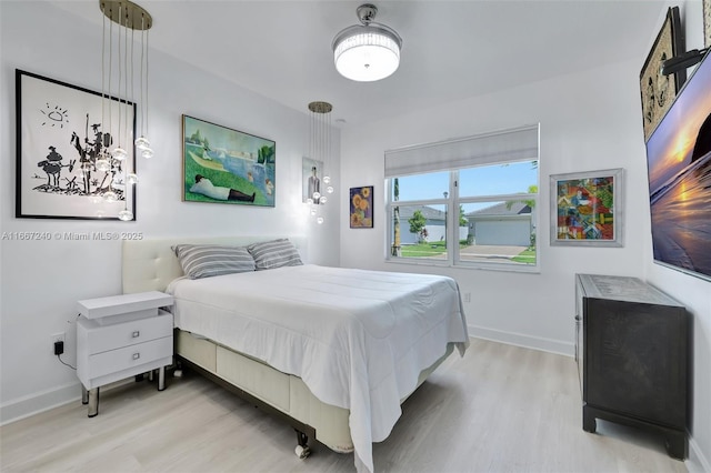 bedroom featuring light hardwood / wood-style floors