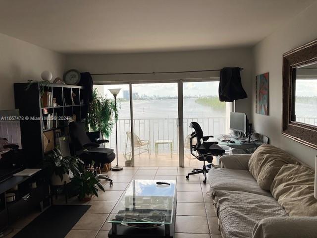 living room featuring light tile patterned floors