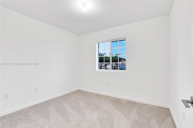 spare room with carpet flooring