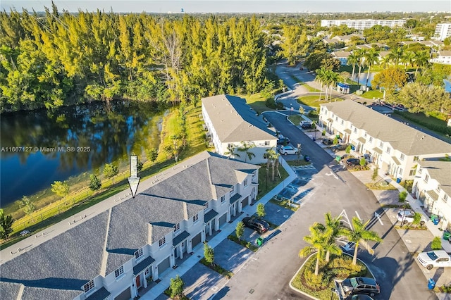 birds eye view of property featuring a water view