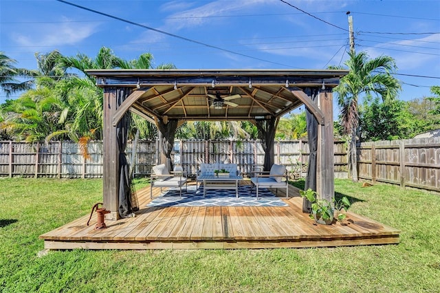 exterior space featuring a gazebo, a yard, an outdoor hangout area, and a deck