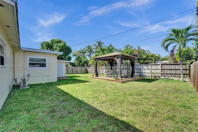 view of yard featuring a gazebo and cooling unit