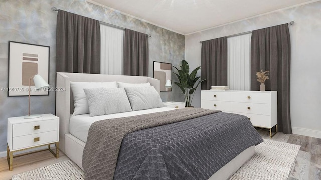 bedroom with crown molding, baseboards, and wood finished floors