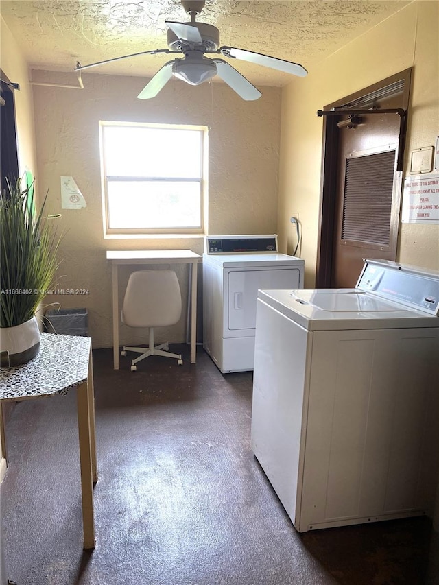 laundry area featuring washer and clothes dryer, a textured ceiling, carpet, and ceiling fan