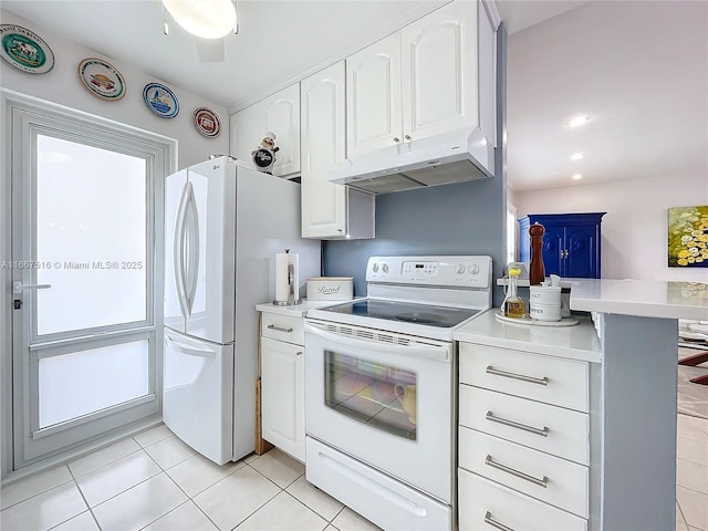 kitchen featuring ceiling fan, white cabinetry, white appliances, and light tile patterned floors