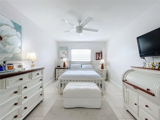 bedroom featuring ceiling fan and light tile patterned flooring