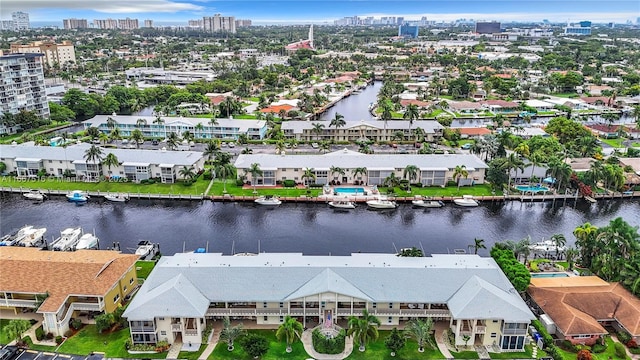 birds eye view of property featuring a water view