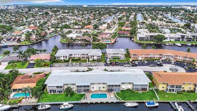 birds eye view of property featuring a water view