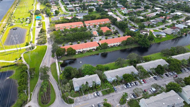 bird's eye view with a water view