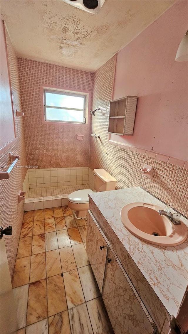 3230 N 23rd Ave, Hollywood, FL 33020 - half bathroom featuring toilet, a textured ceiling, and tile walls