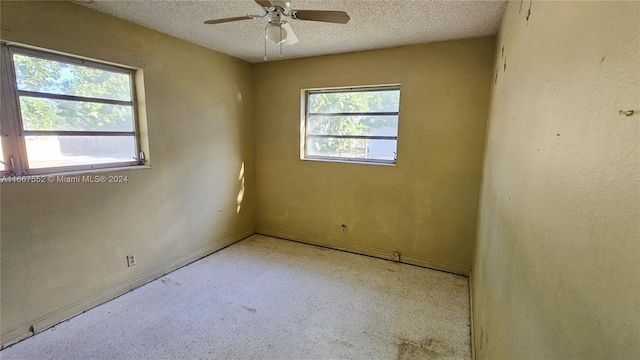 3230 N 23rd Ave, Hollywood, FL 33020 - spare room with a textured ceiling and a ceiling fan