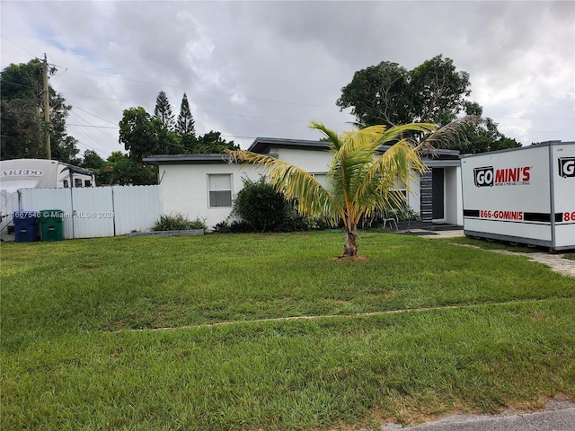 view of front of home with a front yard