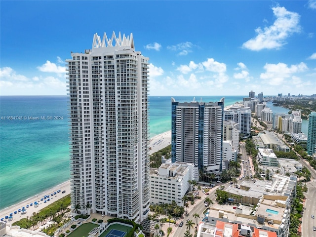 bird's eye view featuring a water view and a view of city